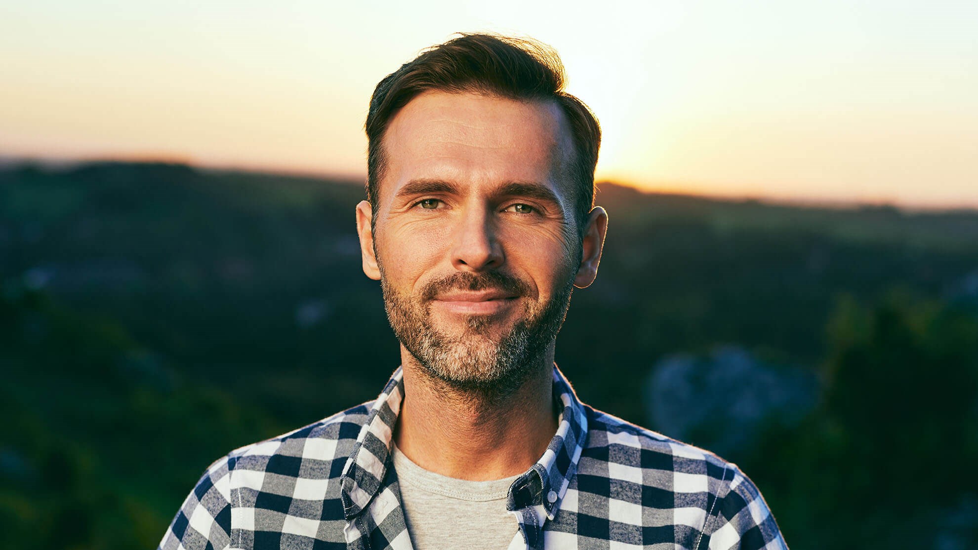 man in plaid shirt